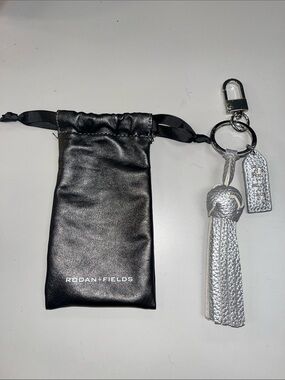Rodan + Fields Black Pouch with Silver leather Tassel Keyring